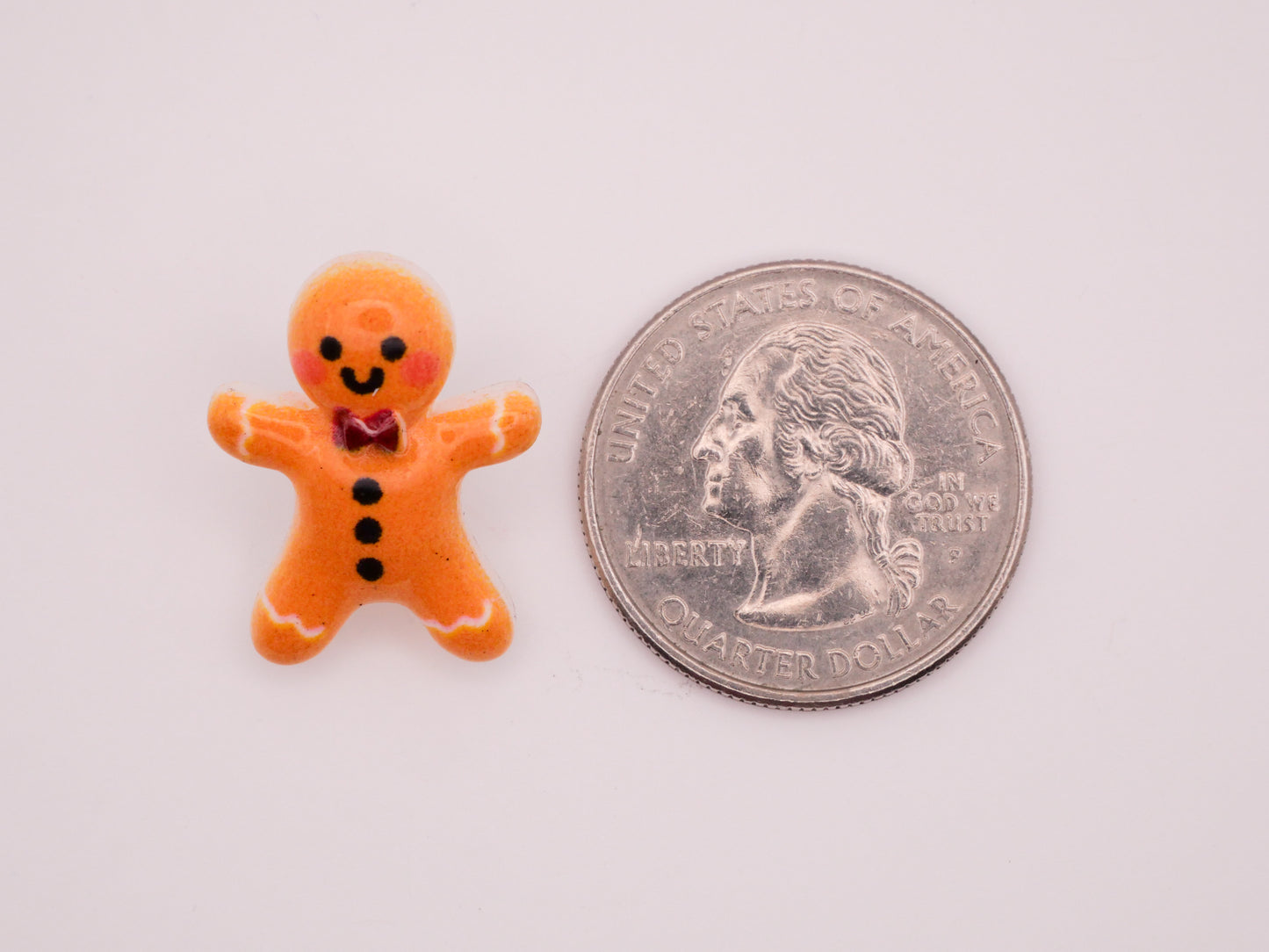 Gingerbread Man Bow Tie Plastic Set of Three Buttons 17x23mm
