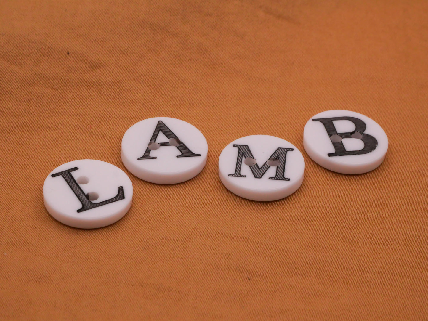 Lamb Verbal Letters Plastic Set of Four Buttons 15mm