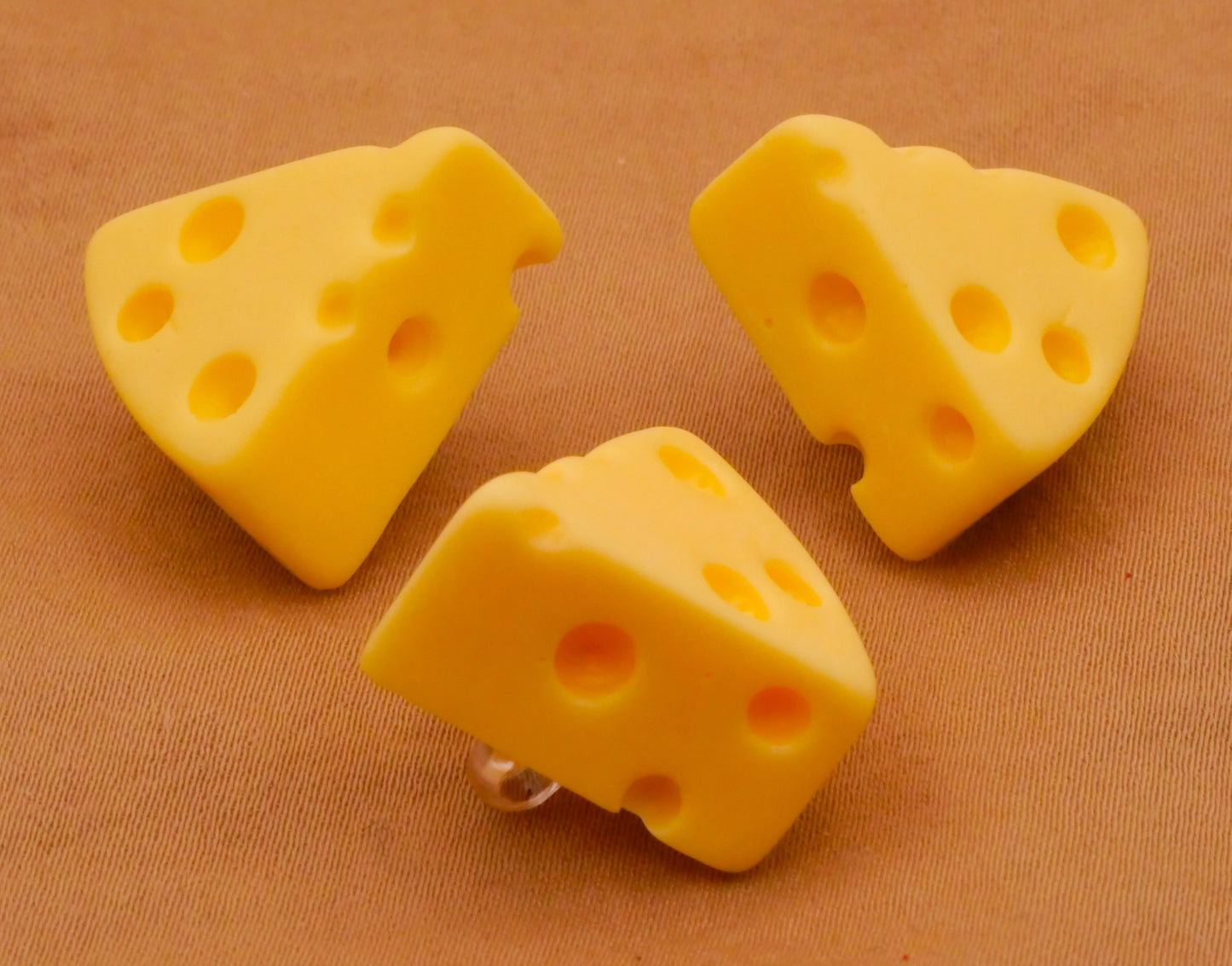 Swiss Cheese Wedge Plastic Set of Three Buttons 20mm