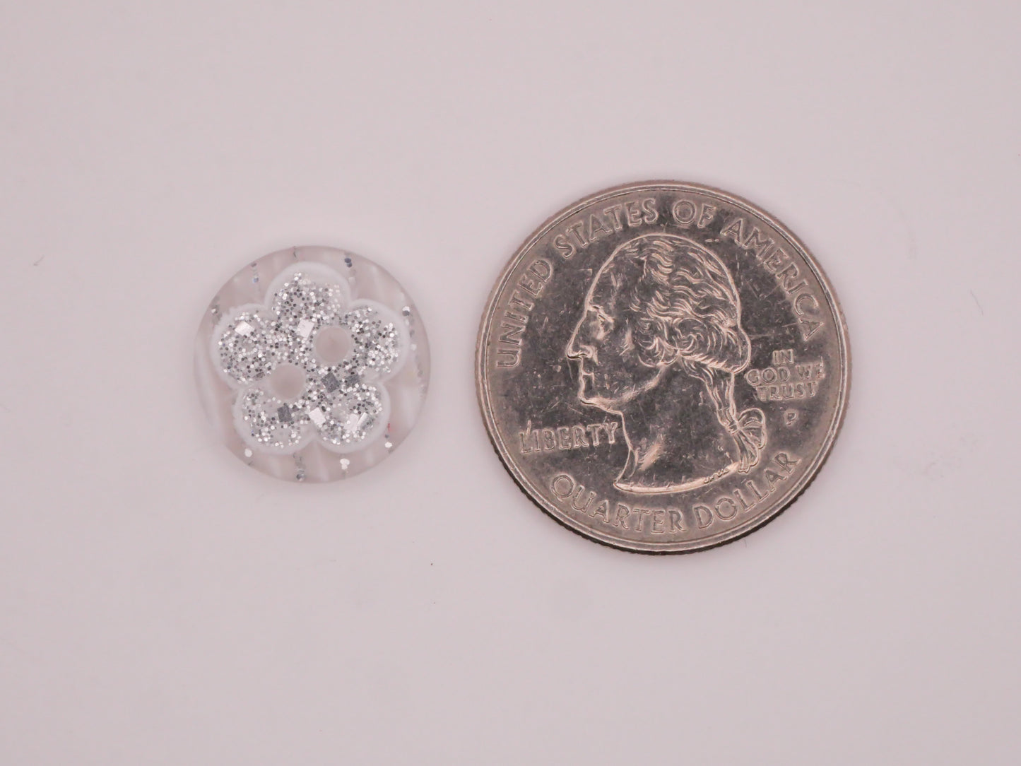 Flower Glitter Design in Plastic Set of Ten Buttons 15mm