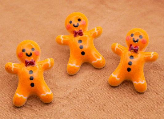 Gingerbread Man Bow Tie Plastic Set of Three Buttons 17x23mm