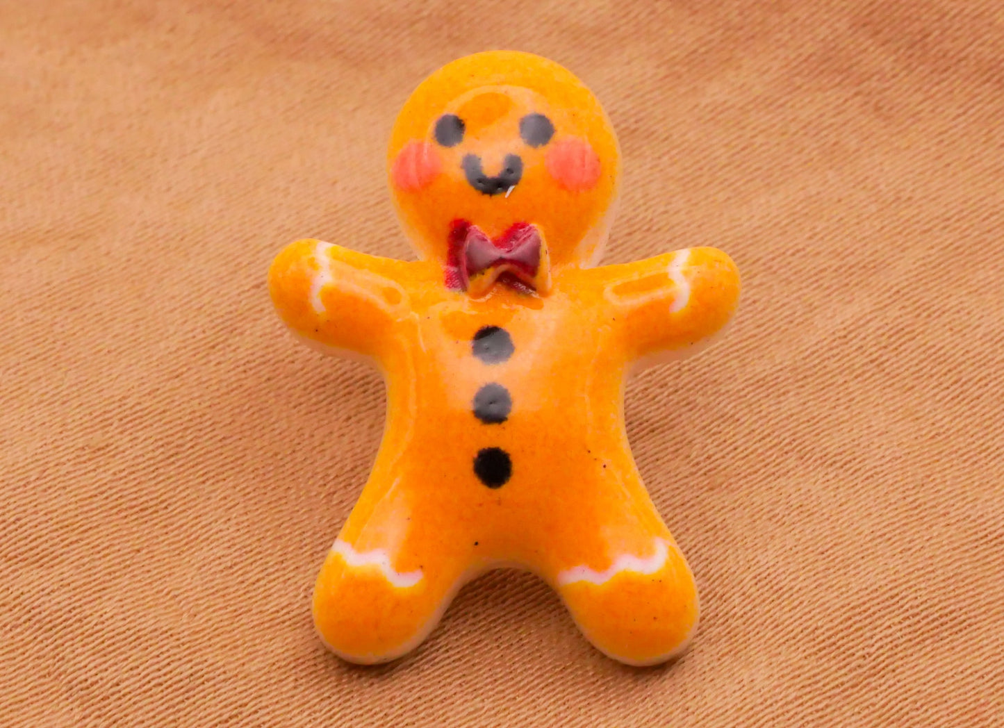 Gingerbread Man Bow Tie Plastic Set of Three Buttons 17x23mm