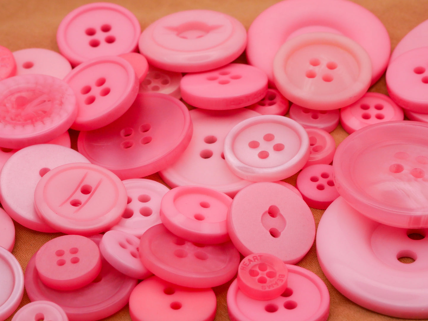 Pink Plastic Assorted Set of Fifty Buttons 9-38mm