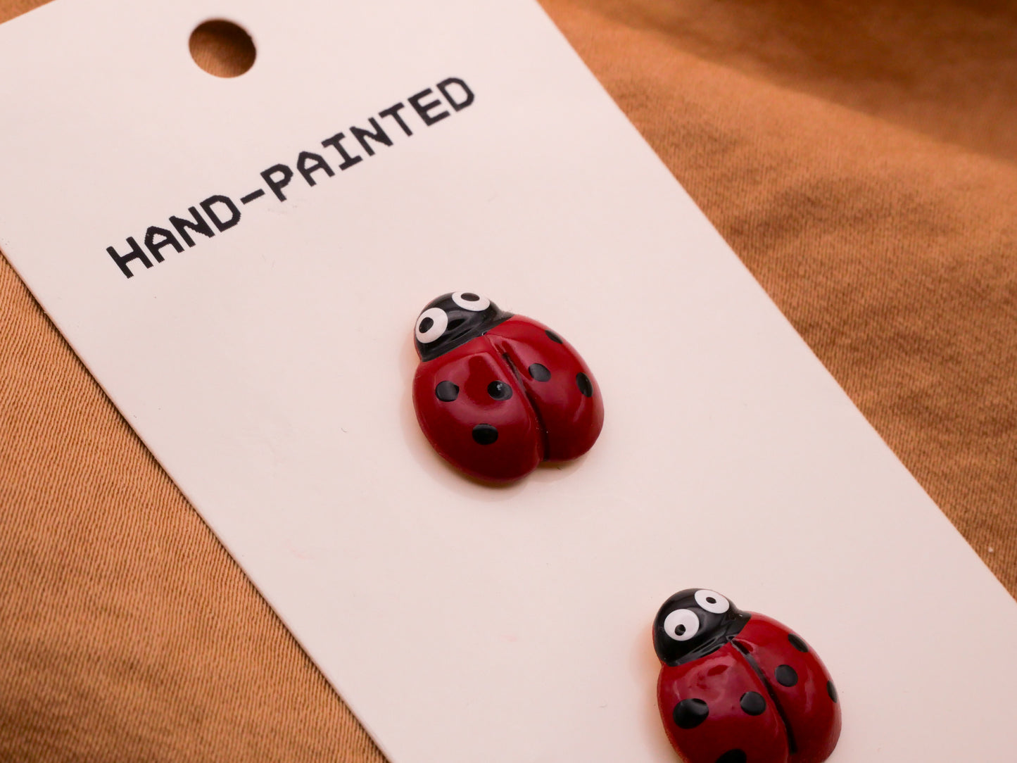 Ladybug Hand-Painted Metal JHB Carded Pair of Buttons 13x14mm