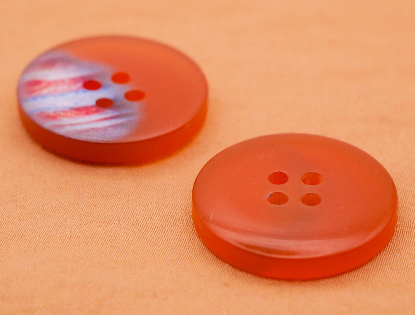 Jupiter Image Frosted Orange Plastic Pair of Buttons 26mm