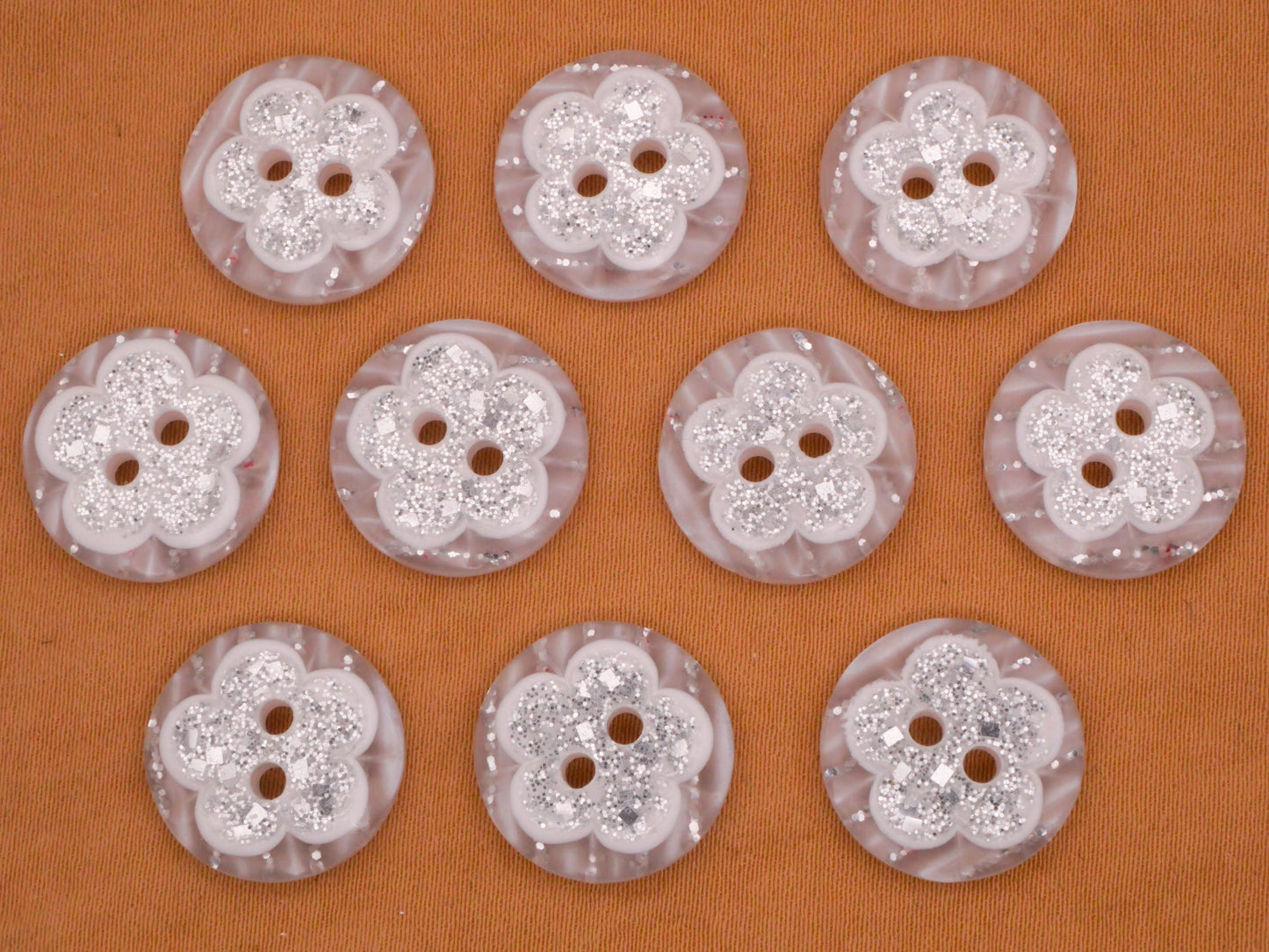 Flower Glitter Design in Plastic Set of Ten Buttons 15mm