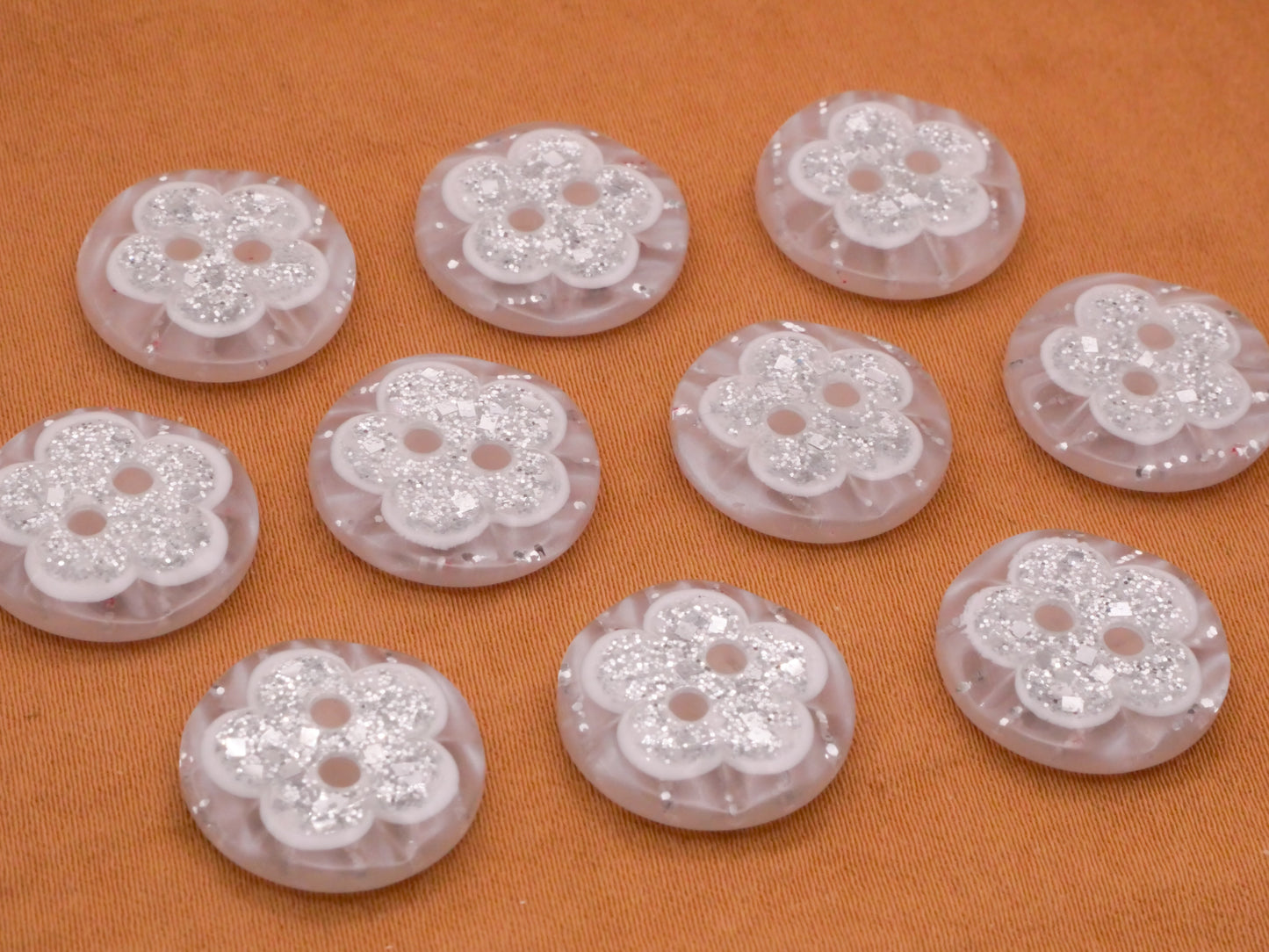 Flower Glitter Design in Plastic Set of Ten Buttons 15mm