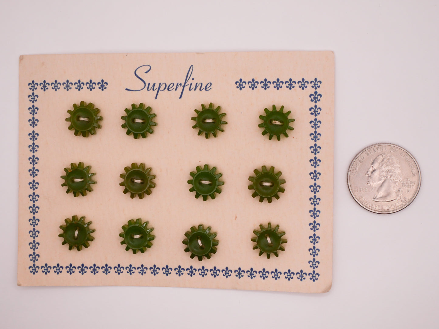Gears Spokes Green Early Plastic Carded Set of Twelve Buttons 12mm