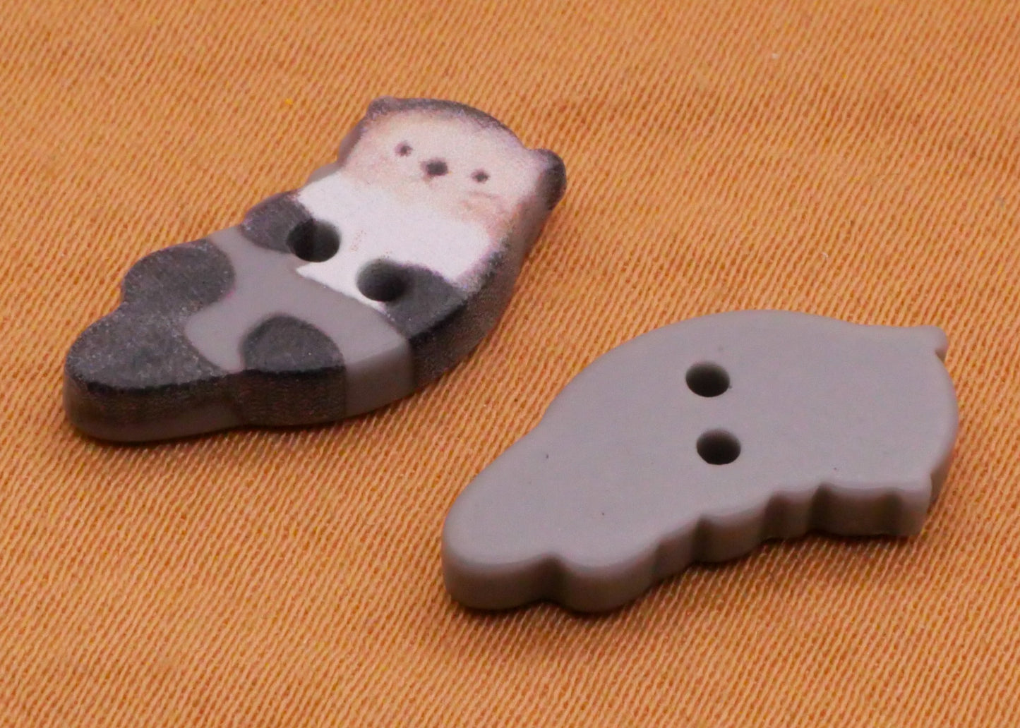 Otter Marine Animal Plastic Pair of Buttons 9x16mm