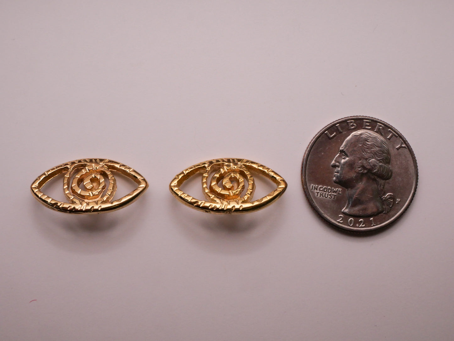 Hypnotized Spiral Eye Gold Metal Pair of Buttons 13x24mm