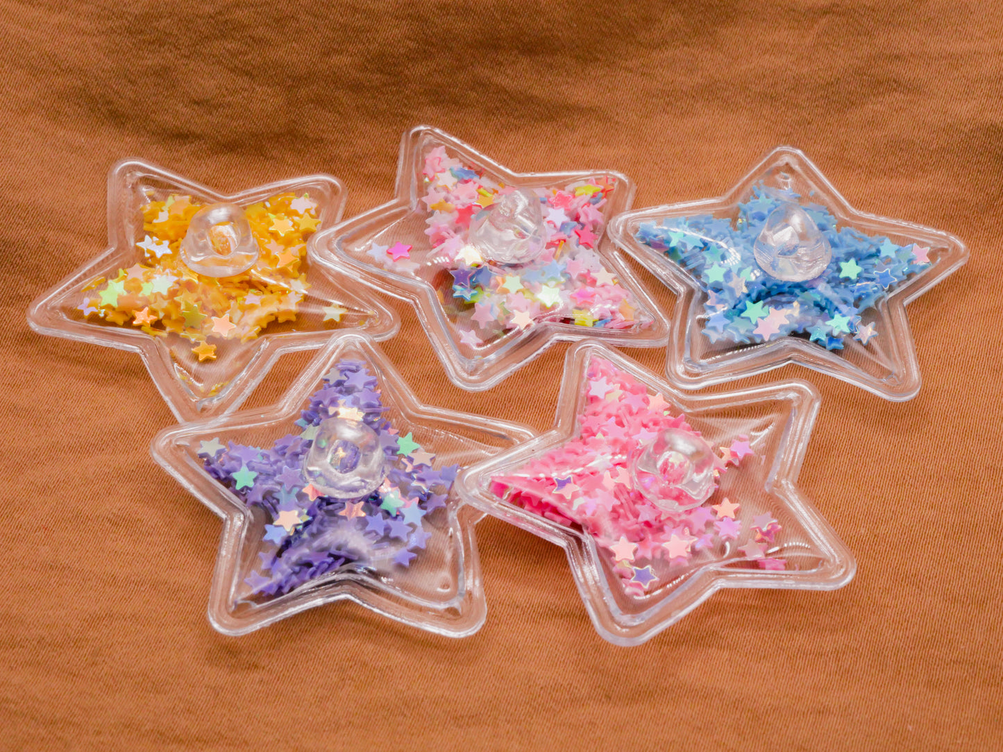 Star Glitter Filled Pliable Moveable Plastic Set of Five Buttons 36mm