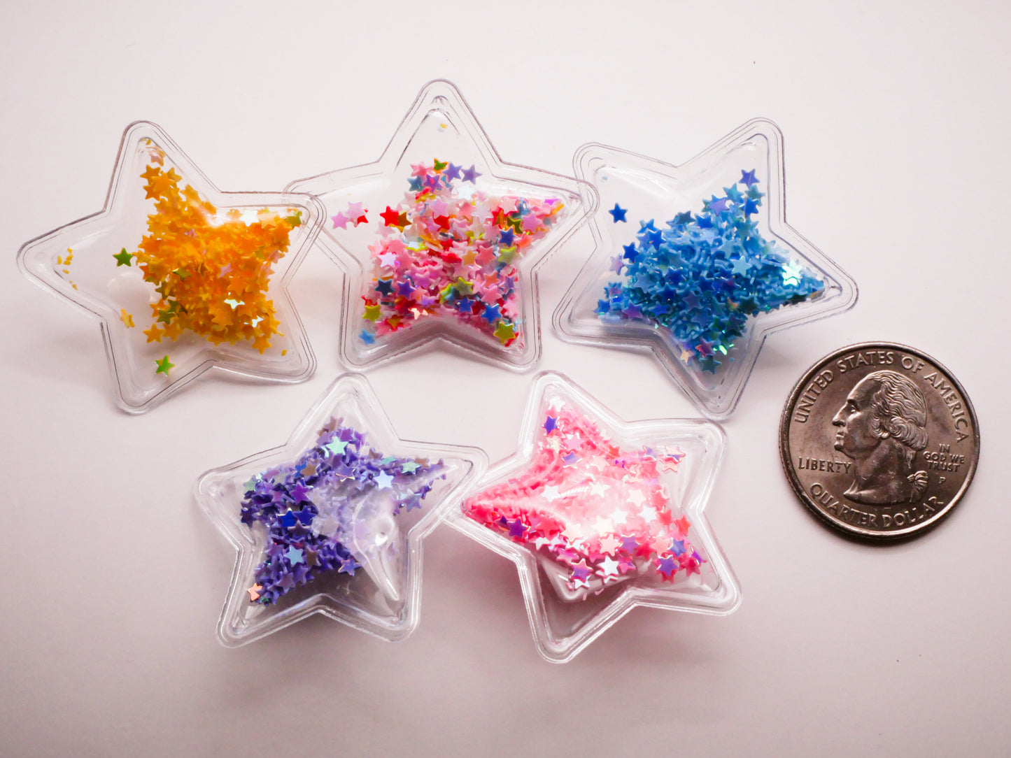 Star Glitter Filled Pliable Moveable Plastic Set of Five Buttons 36mm